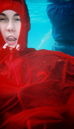 swim in clothes poncho red underwater