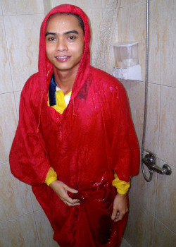 wet poncho cape under shower